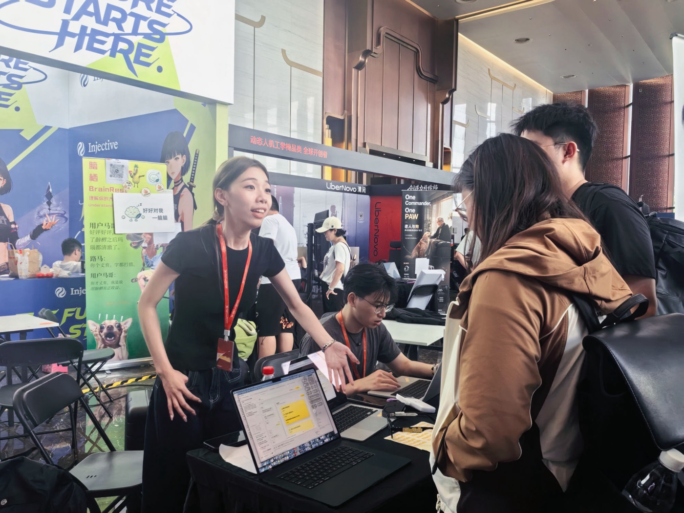Pitching KiboTalk to visitors at the AdventureX booth