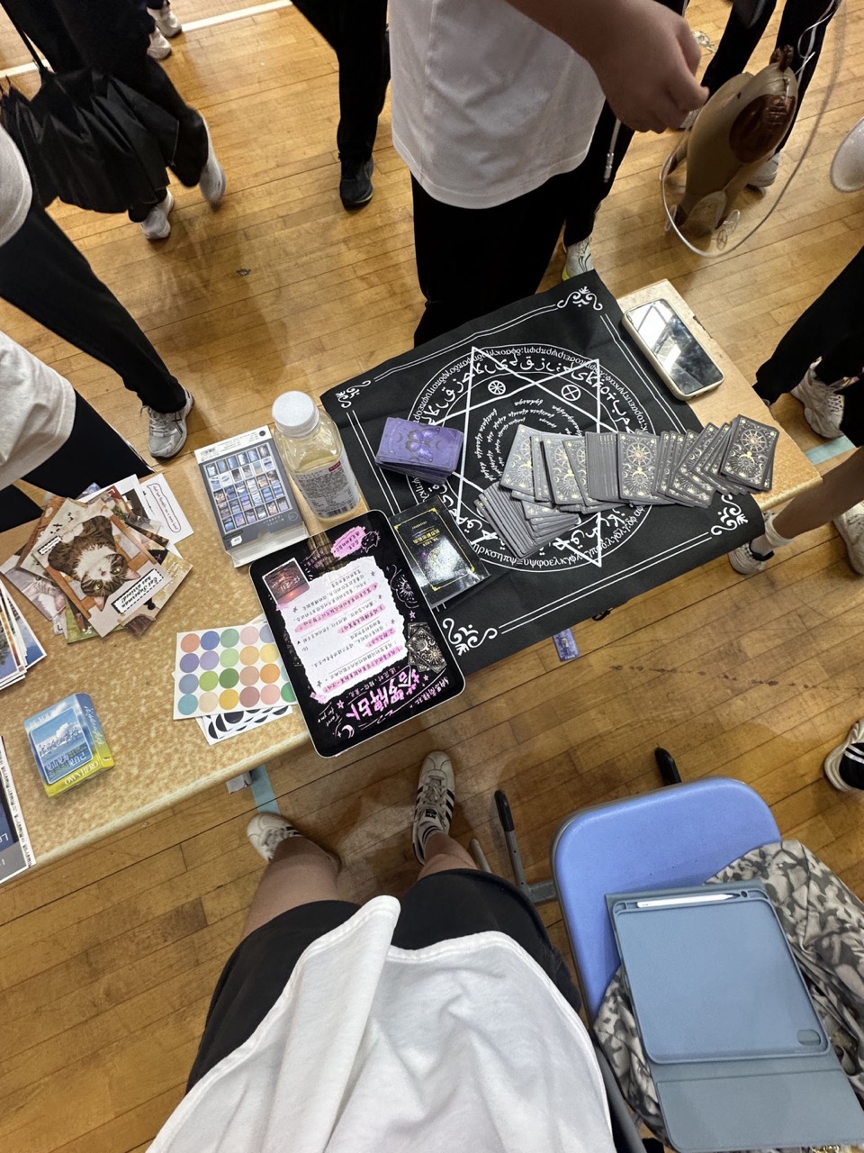 The tarot reading mat in action at the flea market